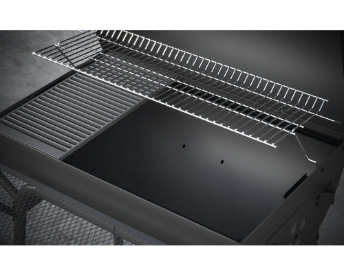 Gedetailleerde weergave van een houtskoolgrill met grillrooster en warmhoudrooster.