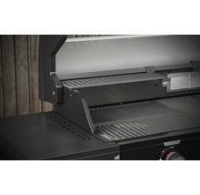 Detailopname van een open gasbarbecue met grillrooster