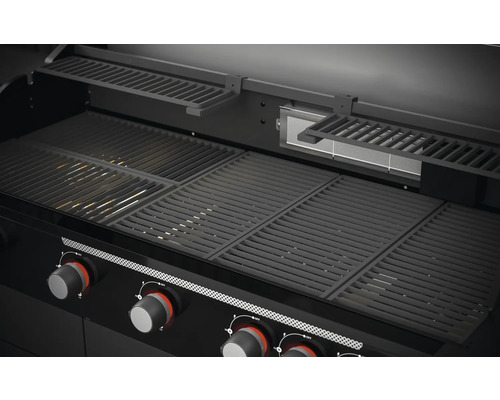 Barbecue met grillroosters en warmhoudrek
