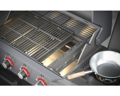 Gedetailleerd aanzicht van een gasbarbecue met grillrooster en een kookpan