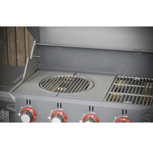 Detailopname van een barbecue met grillrooster en bedieningsknoppen