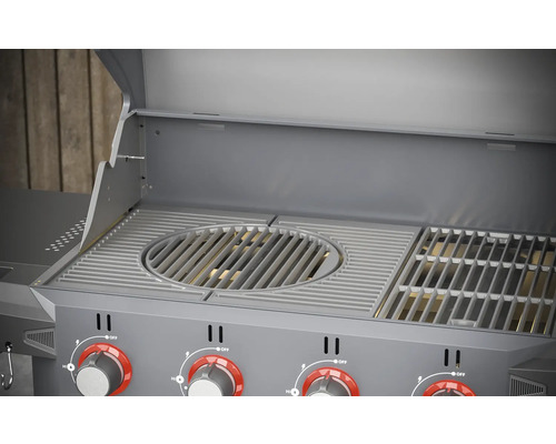 Detailopname van een barbecue met grillrooster en bedieningsknoppen