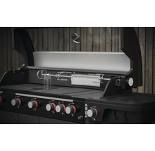 Detailopname van een gasbarbecue met draaispit