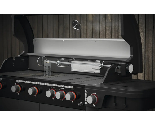 Detailopname van een gasbarbecue met draaispit