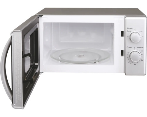 Geopende magnetron met draaiplateau aan de binnenkant