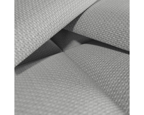 Close-up van een grijze meubelstof.