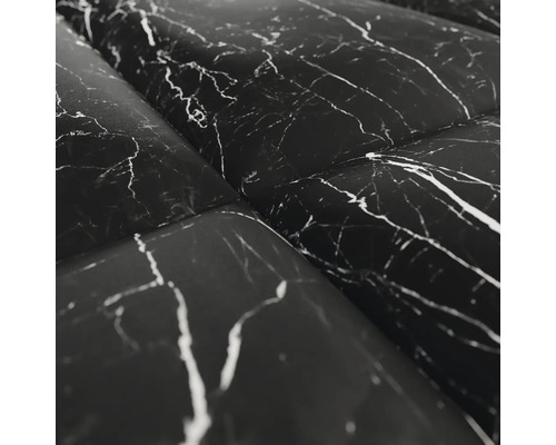 Close-up van een folie met marmerpatroon.