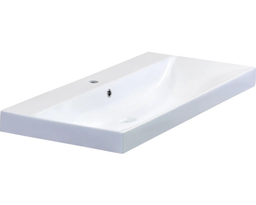 Wastafel van keramiek met kraangat en overloop