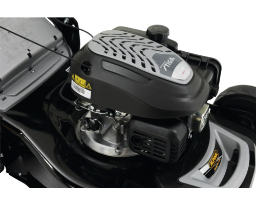 Detailopname van de motor van een grasmaaier