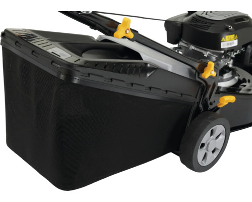 Gazontractor met opvangbak