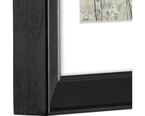 Detail van een zwarte fotolijst