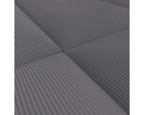 Close-up van een geribbelde grijze matras