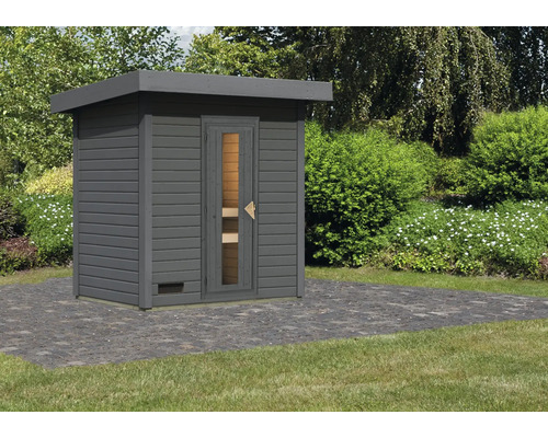 Houten sauna met glazen deur in de tuin