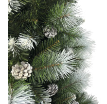 Close-up van een kunstmatige kerstboom met dennenappels
