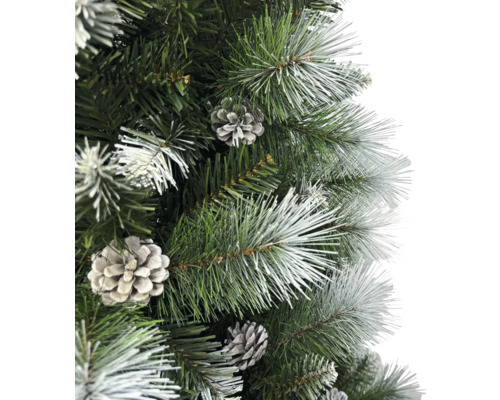 Close-up van een kunstmatige kerstboom met dennenappels