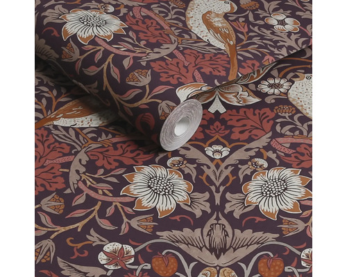 Een rol behang met vogel- en bloemmotief.