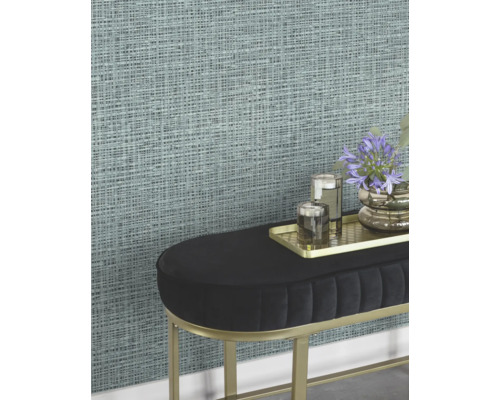 Close-up van een gestructureerd behang met een abstract geweven patroon