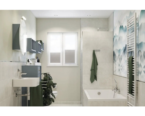 Lichte badkamer met wastafel, bad en radiator