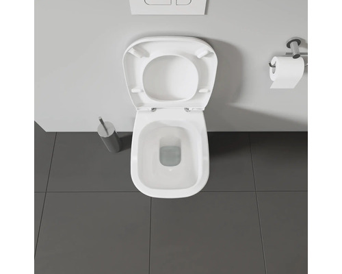 Bovenaanzicht van een toilet met open deksel in een badkamer.