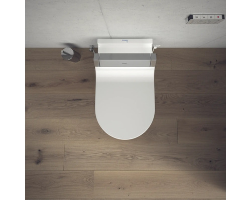 Douchetoilet met afstandsbediening en toiletpapierhouder in de badkamer