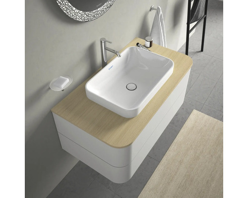 Moderne badkamer met opzetwastafel op wastafelonderkast