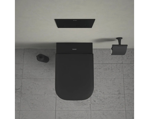 Bovenaanzicht van een zwart toilet met stortbak, bedieningspaneel en toiletpapierhouder