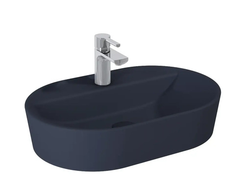 Ovale keramische opzetwastafel met kraan