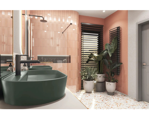 Lichte badkamer met dubbele wastafel, armaturen, radiator en planten