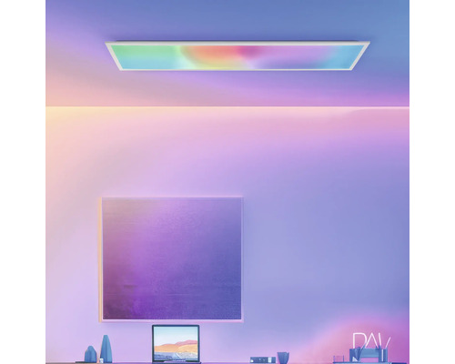 Kantoorruimte met bureau, laptop, schilderij en plafondlamp