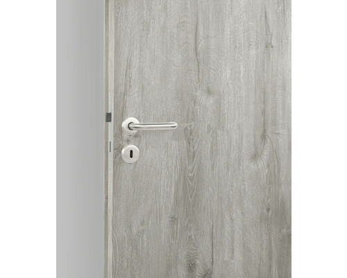 Binnendeur met houten patroon en deurklink