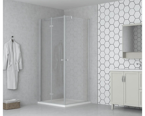 Badkamer met douchecabine, wastafelonderkast en badjas aan de muur