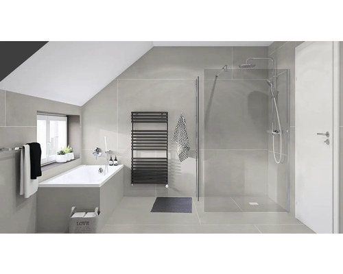 Badkamer met ligbad, douchecabine en handdoekradiator