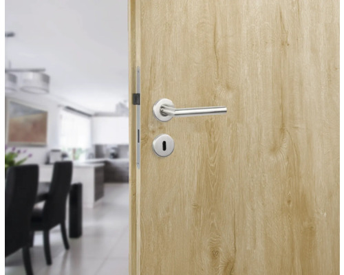 Open binnendeur met deurklink en slot voor een eetkamer en een keuken