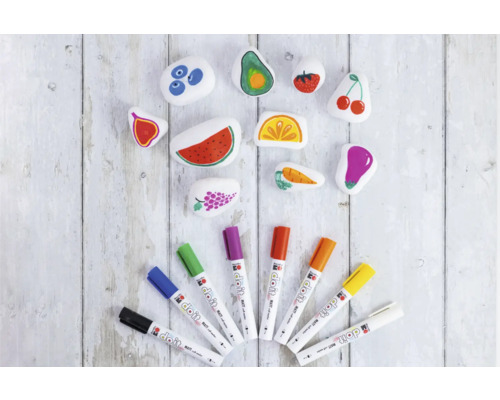 Beschilderde stenen met fruitmotieven en kleurpotloden
