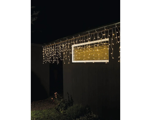 KONSTSMIDE Kerstverlichting LED lichtsnoer met afstandsbediening 200 lampjes extra warmwit 31,84 m Gevel met verlichte lichtketting onder het dak