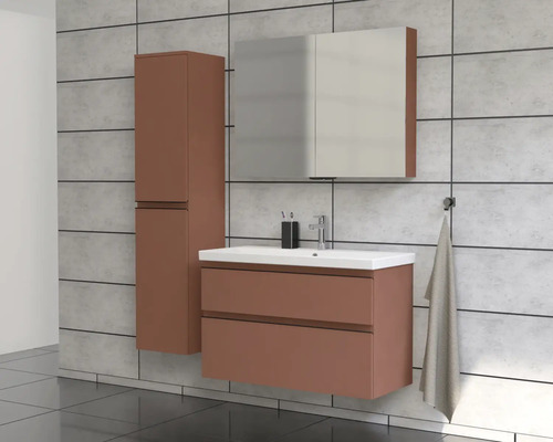 Badkamer met wastafel, spiegelkast en hoge kast