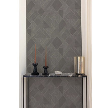 Grijze behang met patroon op een muur