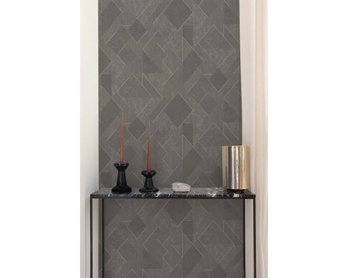 Grijze behang met patroon op een muur