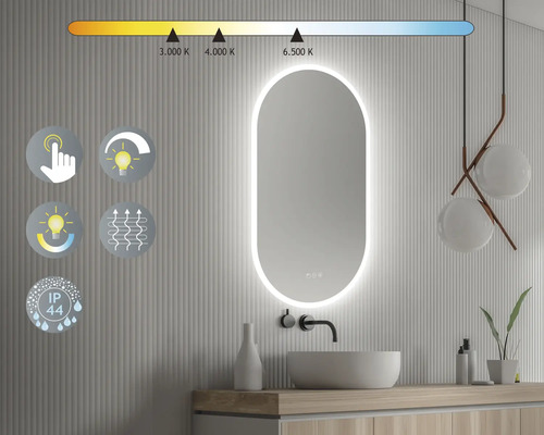 Badkamer met verlichte spiegel, wastafel en temperatuurregeling