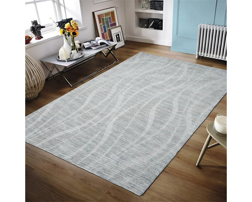 Grijs tapijt met golfpatroon in een woonkamer