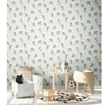 Kinderkamer met behang met koala motief en speelgoed