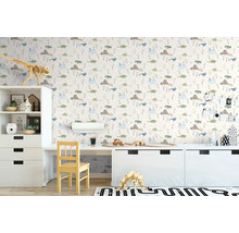 Kinderkamer met dinosaurusbehang, bureau en witte meubels