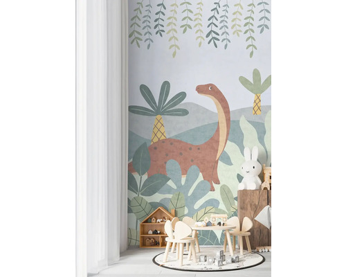 Kinderkamer met dinosaurusbehang, tafel, stoelen en speelgoed