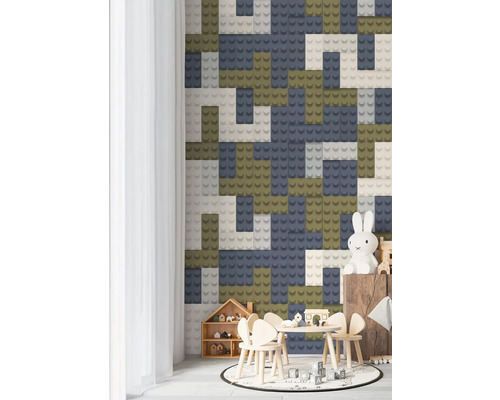 Kinderkamer met speelgoed en muurdecoratie in de stijl van bouwstenen