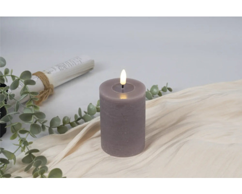 Decoratieve ledkaars op stof