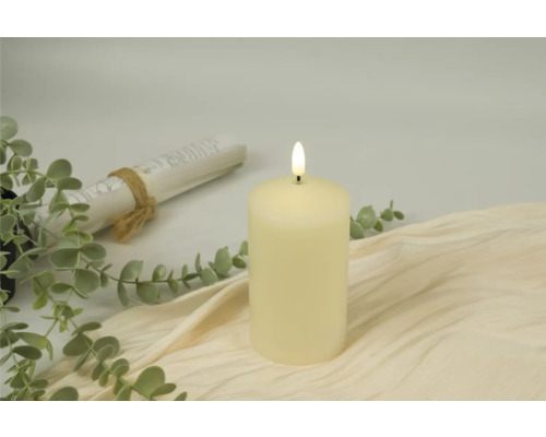 Decoratieve waskaars met lichteffect en decoratie