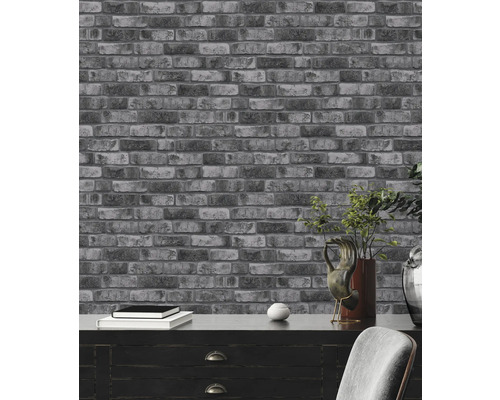 Grijze bakstenen behang in interieur