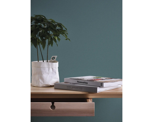 Decoratieve scène met plant, boeken en een bureau