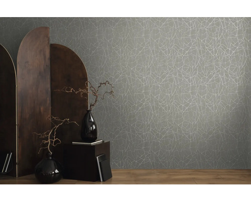 Interieurontwerp met grijs behang met takkenpatroon, decoratie en kamerscherm