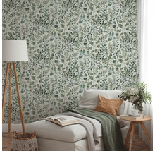 Woonkamer met botanisch behang, ligstoel en staande lamp